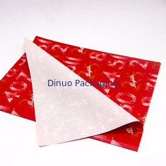 Confezione regalo di Natale Confezione di carta velina rossa con stampa floreale in lamina d'oro