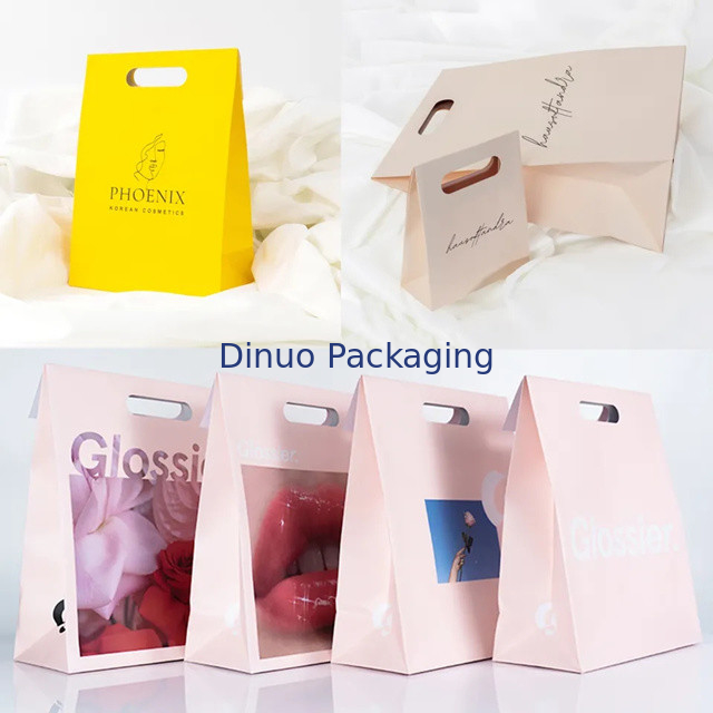 Imballaggio di abbigliamento Manicotto a taglio a stampaggio Acquisti Borsa di carta Kraft Borse regalo gialle personalizzate