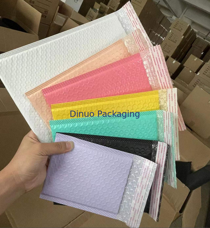 Borse di posta a bolla protettive di design rosa riciclabile al 100% con funzione impermeabile per prodotti confezionati