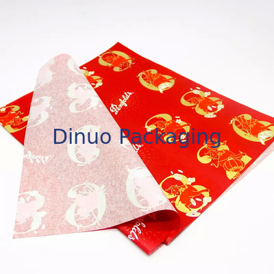 Confezione regalo di Natale Confezione di carta velina rossa con stampa floreale in lamina d'oro