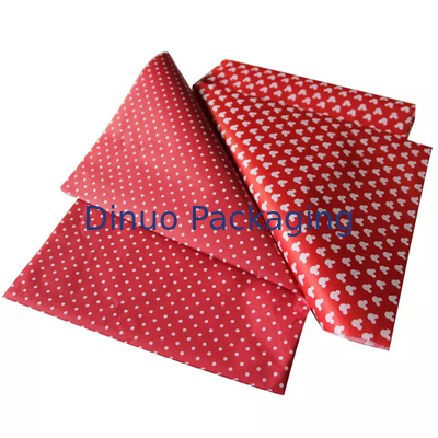 Confezione regalo di Natale Confezione di carta velina rossa con stampa floreale in lamina d'oro
