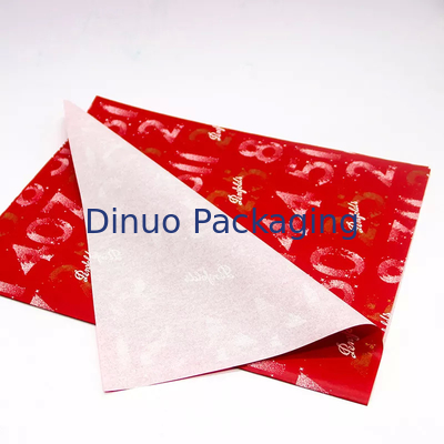 Confezione regalo di Natale Confezione di carta velina rossa con stampa floreale in lamina d'oro