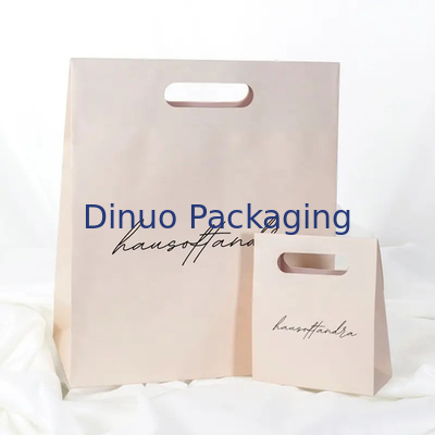 Imballaggio di abbigliamento Manicotto a taglio a stampaggio Acquisti Borsa di carta Kraft Borse regalo gialle personalizzate